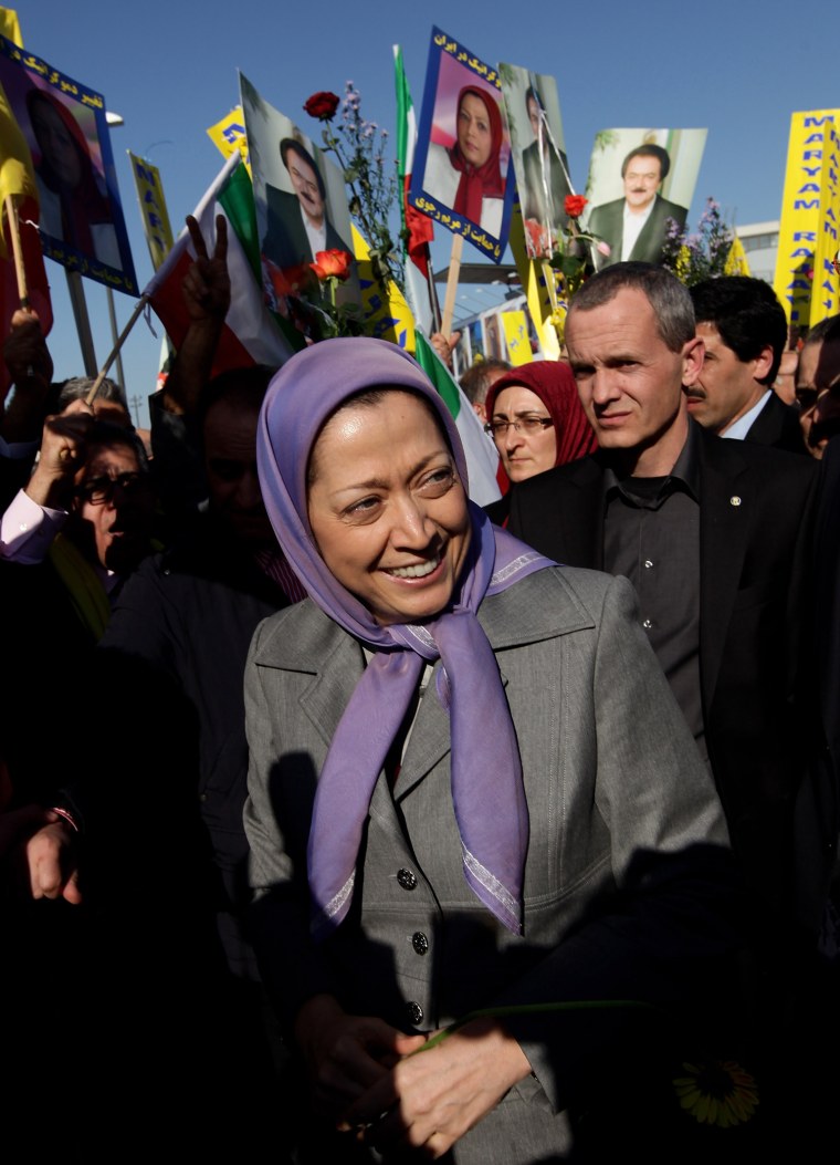 BERLIN - MARCH 22: Maryam Rajavi, president of the National Council of Resistance of Iran, greets several hundred Iranian expatriates who had gathered to welcome her upon her arrival at Tegel Airport on March 22, 2010 in Berlin, Germany. Rajavi, who is among the leading Iranian opposition politicians in exile, is in Berlin to meet with members of the German Bundestag. (Photo by Sean Gallup/Getty Images) *** Local Caption *** Maryam Rajavi